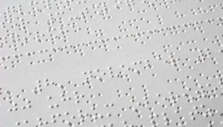 close up of brail on page